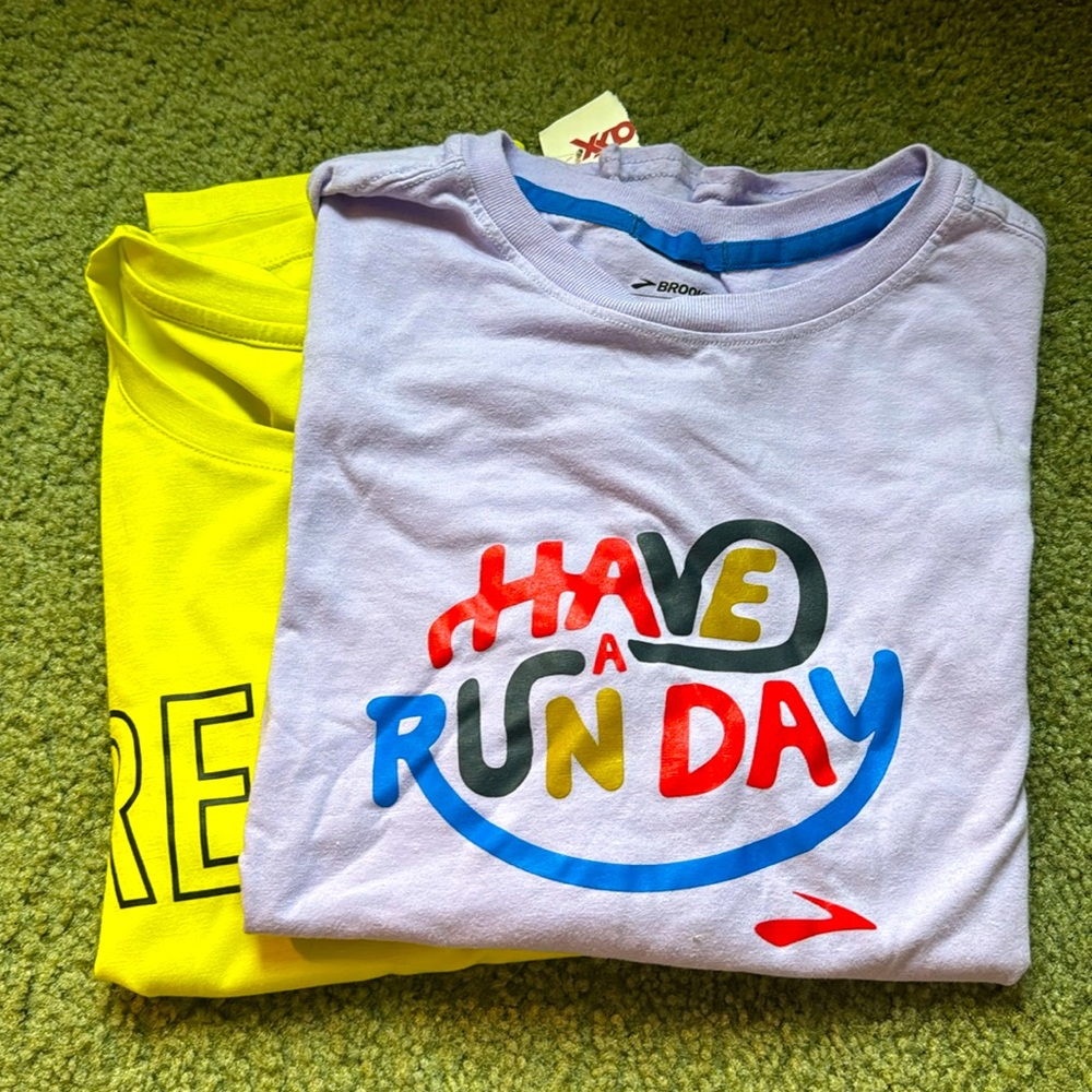 I am selling running shirts. One still has the tags and the other was worn once.